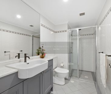 Renovated two-bedroom w/LUG located in the Princeton Building! - Photo 5