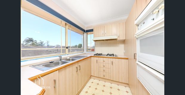 Comfortable Living in a Prime Location - Photo 1