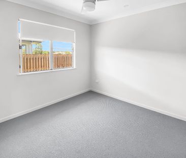 Modern Family Home in Sought-After Bushland Beach - Photo 3