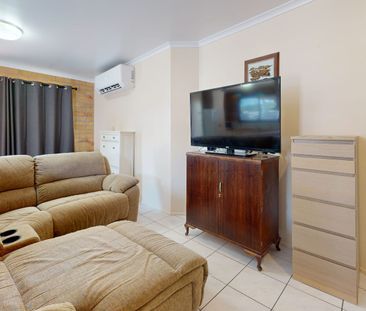 Prime Location – Low-Maintenance Living in the Heart of Town - Photo 1