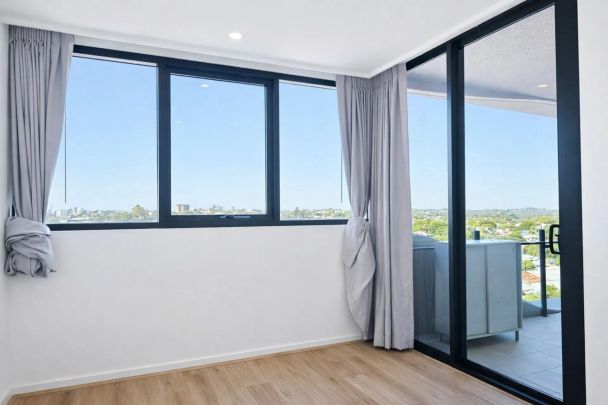 Stylish City Living with Stunning Views | $820 per week - Photo 1