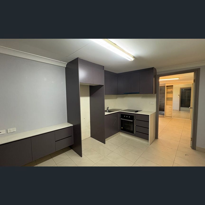 63 Helicia Road, Macquarie Fields, NSW 2564 - Photo 1