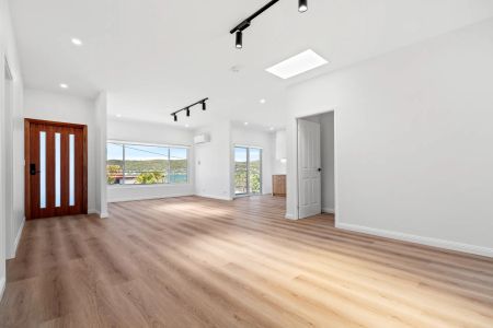 Immaculate Family Home - Freshly Renovated In Prime Location with Water Views - Photo 2