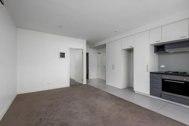 LOW MAINTENANCE UNIT IN A PERFECT LOCATION - Photo 1