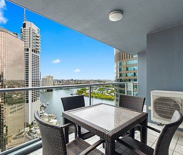 Fully Furnished Apartment with Stunning Brisbane River and Story Bridge Views - Photo 1