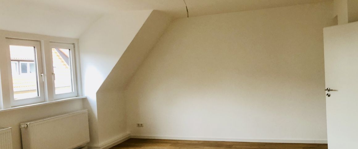 Sanierte Dachgeschosswohnung direkt in der Innenstadt - Photo 1