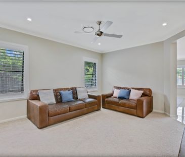 Stunning Family Home with Ducted Air Conditioning and Pool! - Photo 1