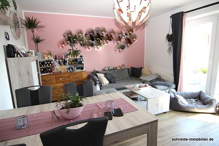 Attraktive 2-Zimmer-Erdgeschoss-Wohnung mit Terrasse und Gartenanteil - Foto 4