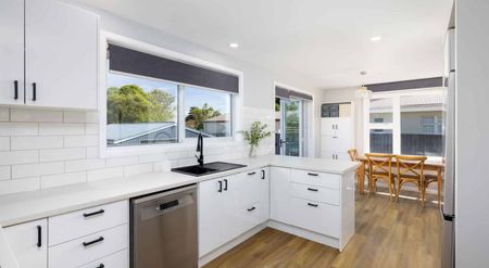 Beautifully Renovated Home with Expansive Entertaining Deck - Photo 2