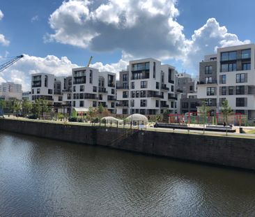 Mainblick! Moderne 2-Zimmerwohnung mit Einbauküche und Terrasse - Foto 2