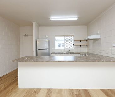 Freshly Renovated Top-Floor Two Bedroom Unit – White Goods - Photo 6