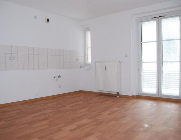 Schicke Singlewohnung mit Balkon - Foto 1