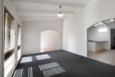 Beautifully Presented 4-Bedroom Home in a Quiet, Central Location - Photo 3