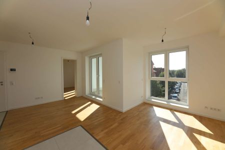 Wohntraum! Hochwertige 2-Raumwohnung mit Loggia in einem exklusiven Schleußiger Neubau! - Photo 2