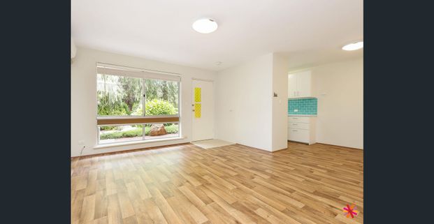 COMFORTABLE LIVING IN DESIRABLE LOCATION - Photo 1