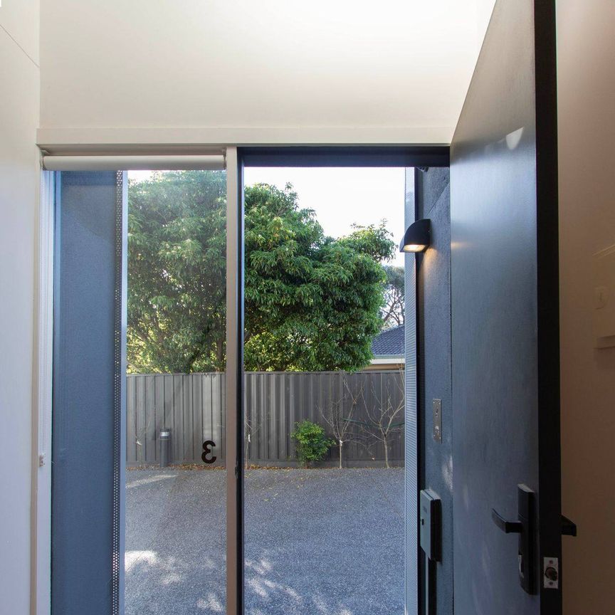 Architectural Townhouse In Brunswick Awaits - Photo 1