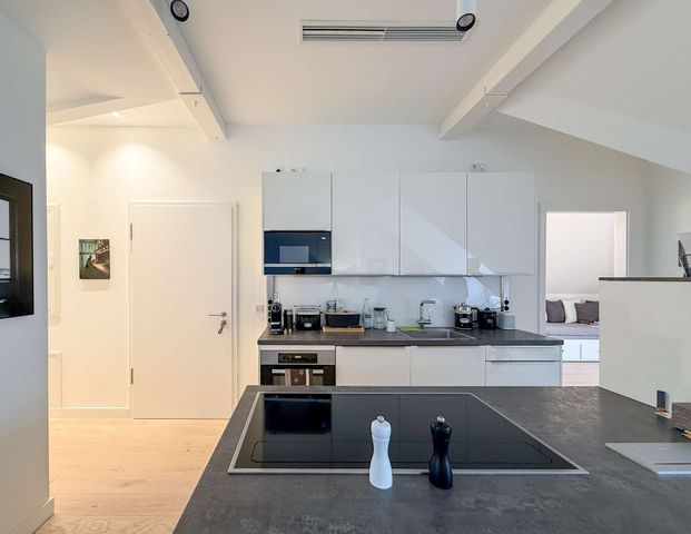 Geschmackvolle 3-Zimmer-Wohnung in ruhiger Westendlage mit Süd-West-Balkon und Skylineblick - Photo 1