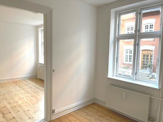 Skøn 3-værelses lejlighed i attraktivt kvarter - Photo 1