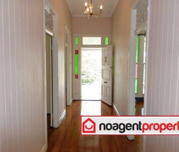 Spacious Four-Bedroom Queenslander with Timeless Charm in Clayfield - Photo 6