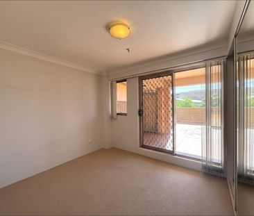 PRIVATE COURTYARD LIVING WITH VIEWS IN THE HEART OF HURSTVILLE - Photo 5