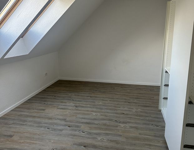 gemütliche Dachgeschosswohnung im Zentrum von Aschendorf - Foto 1