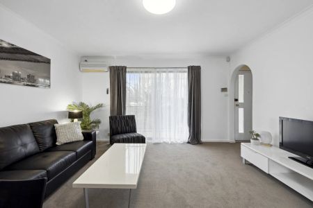 Freshly Updated 2-Bedroom Gem with Modern Comfort & Natural Light - Photo 2