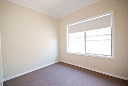 Three bedroom home in sought after location - Photo 2