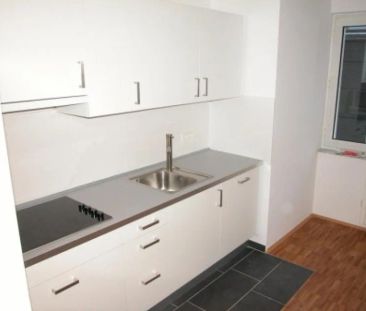 Moderne, zentral gelegene 2-Zimmerwohnung mit schöner Einbauküche i... - Foto 1