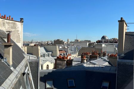 Superbe deux pièces mansardé avec vues - Place des Victoires (LO - Photo 5