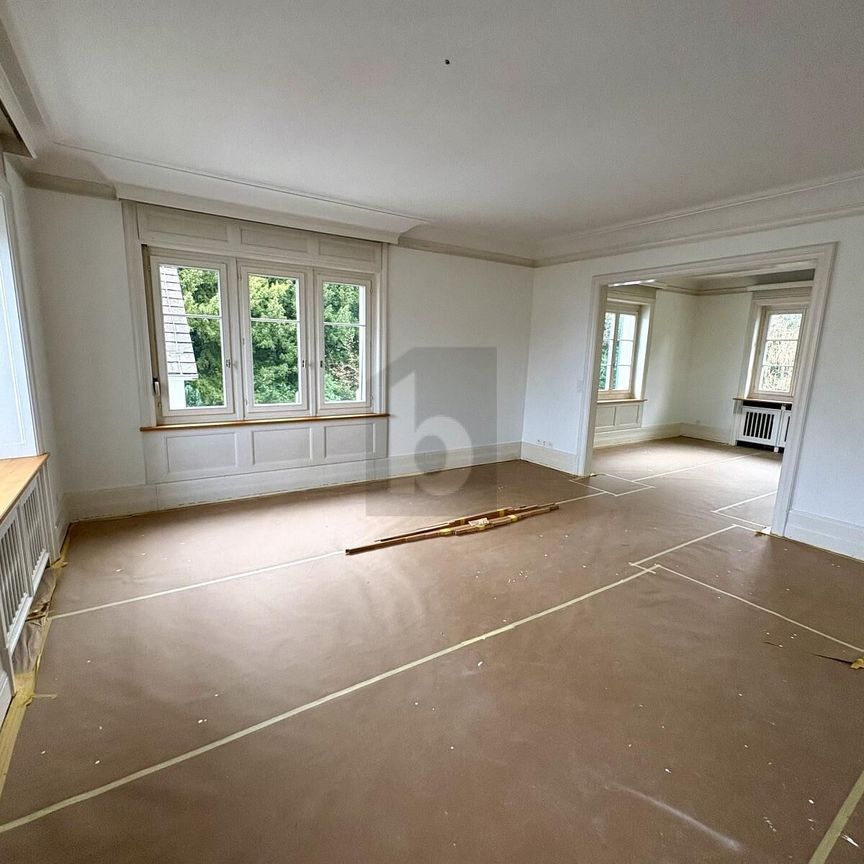 QUIET, CENTRAL, LIGHT-FLOODED WITH LAKE VIEW - Photo 1