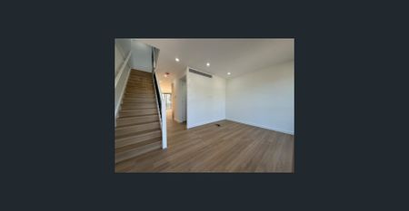 Stylish and Functional 3-Bedroom Home with Multi-Purpose Space - Photo 4