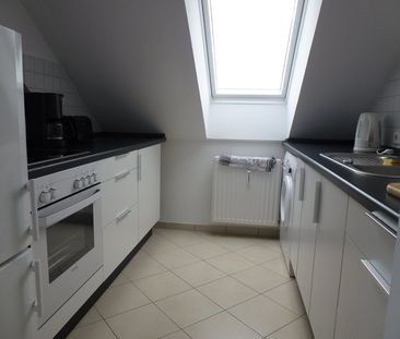 Junges Wohnen im urgemütlichen Dachgeschoß! - Photo 2