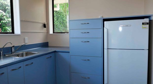 Tidy Two-Bedroom Home with Internal Garage and Charming Bay Window - Photo 1