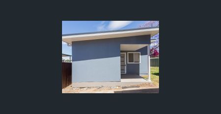 Neat Granny Flat with Natural Light - Photo 4