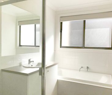 Spacious 3-Bedroom Home with Modern Kitchen & Entertainer’s Backyard - Photo 4