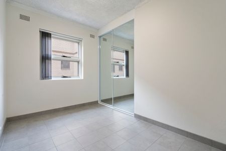 RENOVATED 2 BEDROOM UNITS WITH CAR SPACE - Photo 5