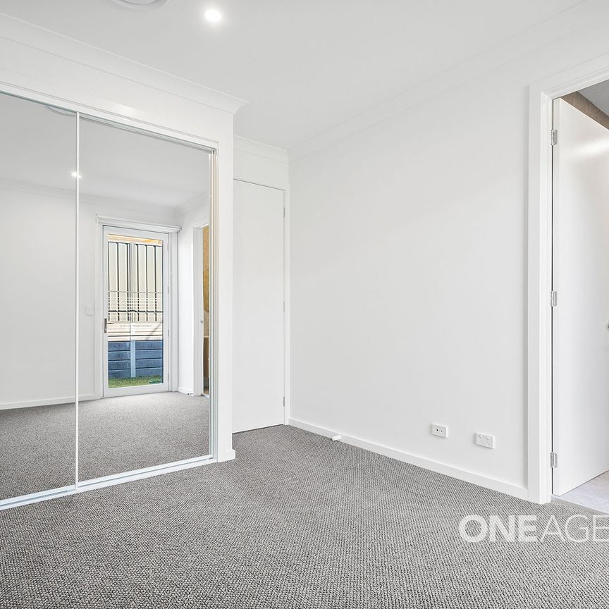 MODERN FAMILY HOME IN A QUIET HORSLEY LOCATION - Photo 1