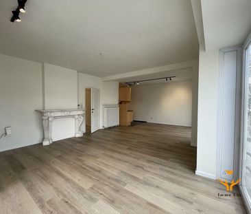 Knap appartement met 2 slaapkamers op de Markt - Photo 2