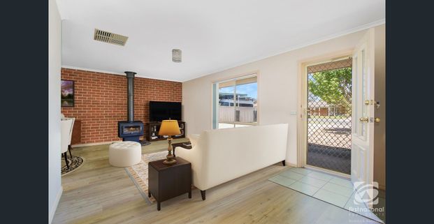 COMFORTABLE FAMILY HOME - Photo 1