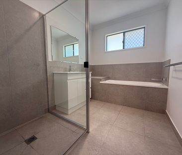 BEAUTIFUL 4 BEDROOM NEW BUILD IN BUSHLAND BEACH - Photo 1