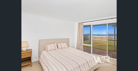 ESCAPE THE ORDINARY AND ENJOY BEACH-FRONT LIVING AT ITS FINEST - Photo 5