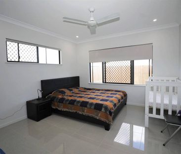 Modern Four-Bedroom Family Home in Prime Location - Photo 5