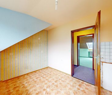 IMMOPARTNER - 3-Zimmer-Dachgeschosswohnung mit Balkon und Garage - Photo 1