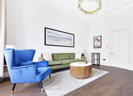An impressive three storey property plus a large decked roof terrace offering panoramic views of London. Tenancy Length: Minimum 12 months EPC rating: E | Council Tax Band G - Photo 3