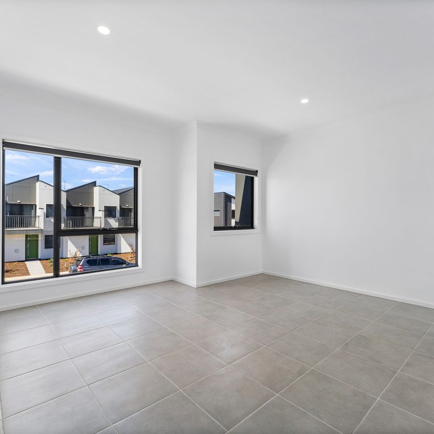 Modern 2-Bedroom Townhouse with Reverse Living & Balcony - Photo 1