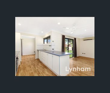 Centrally Located 4 Bedroom home - Photo 2