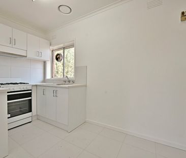 Register to Inspect // Spacious 1-Bedroom Apartment in the Heart of... - Photo 6