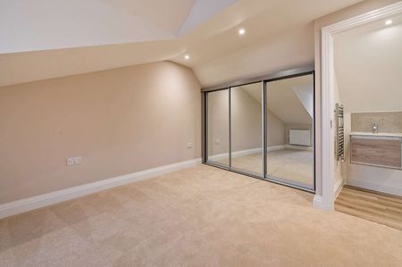 A newly converted two bedroom split level apartment located on the High Street. - Photo 5