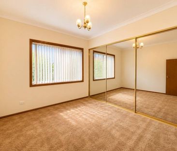 Spacious Family Home with Utilities & Lawn Maintenance Included - Photo 6