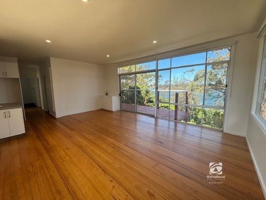 FRESHLY RENOVATED ON THE LAKES EDGE! - Photo 1